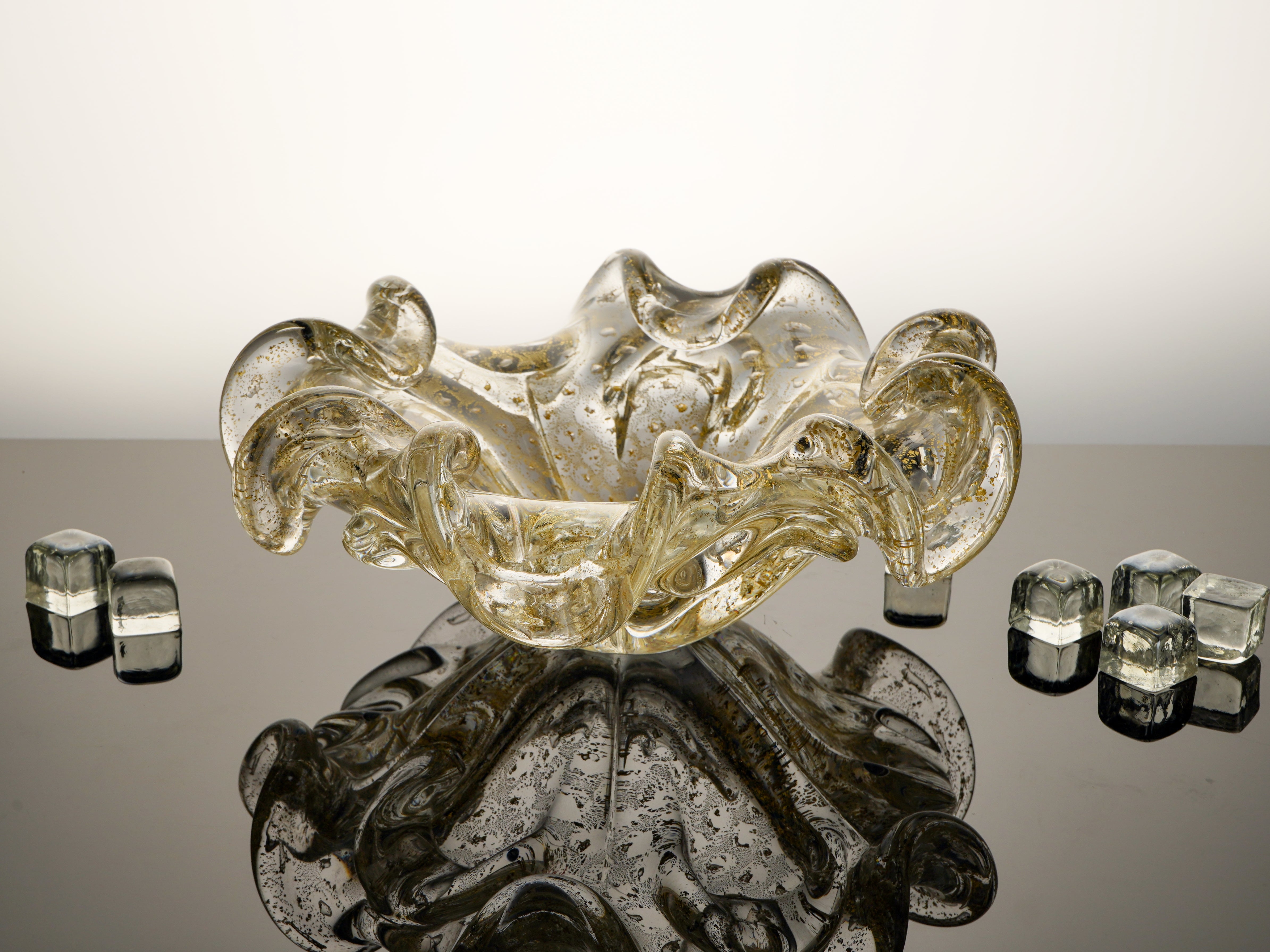 Formia Murano Aura Ashtray, handmade in Italy with Murano glass. Intricate Crystal Gold finish and unique craftsmanship make this a luxurious and one-of-a-kind addition to your home decor.