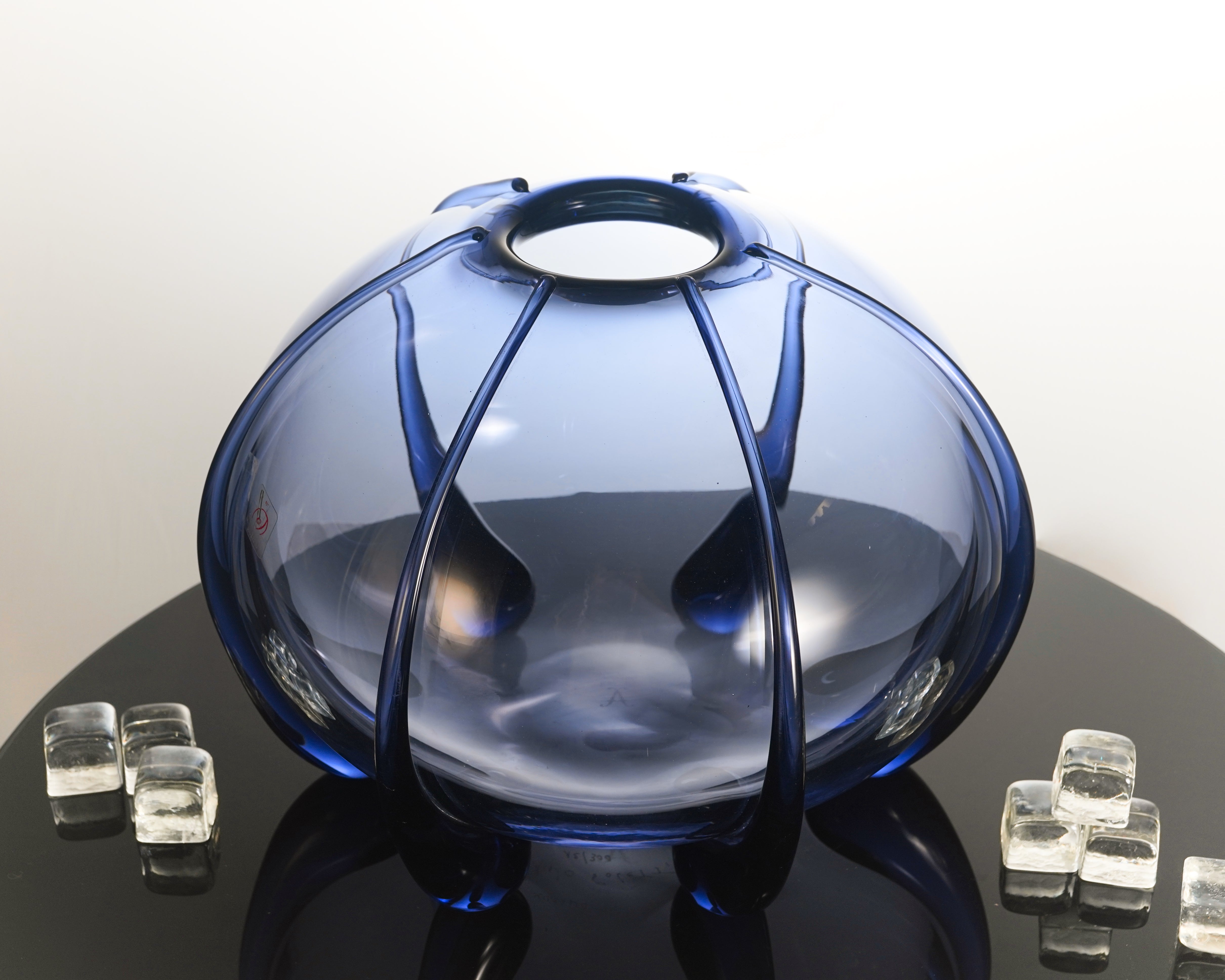 Murano glass vase by Stefano Poletti, featuring a spherical shape with long glass droplets in deep purple, a modern twist on timeless design, perfect for an elegant table setting or as part of the exclusive Bolle Collection.