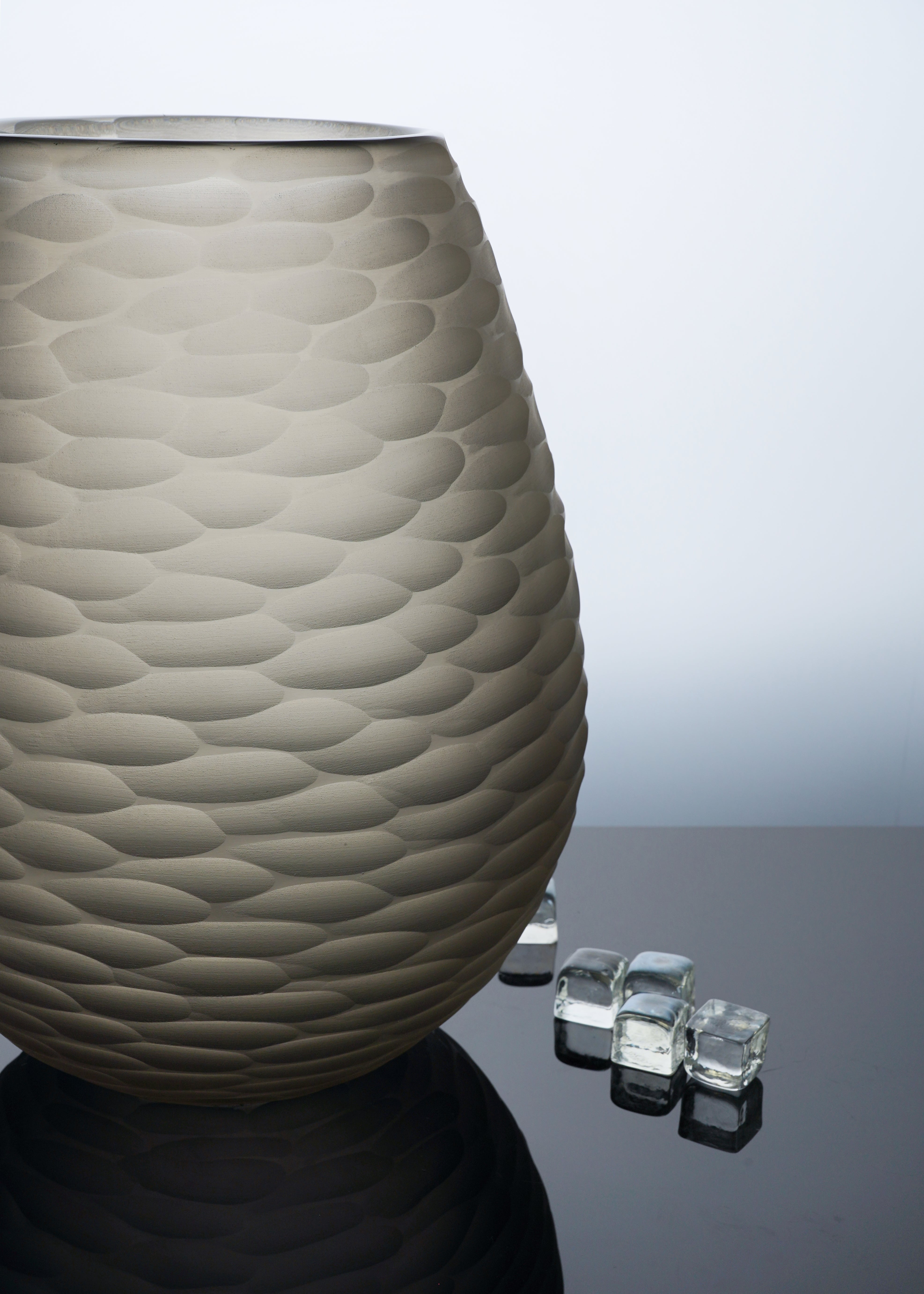 Luxury Murano glass vases from Armani Casa, perfect for showcasing floral arrangements or as elegant decorative pieces in any home decor.