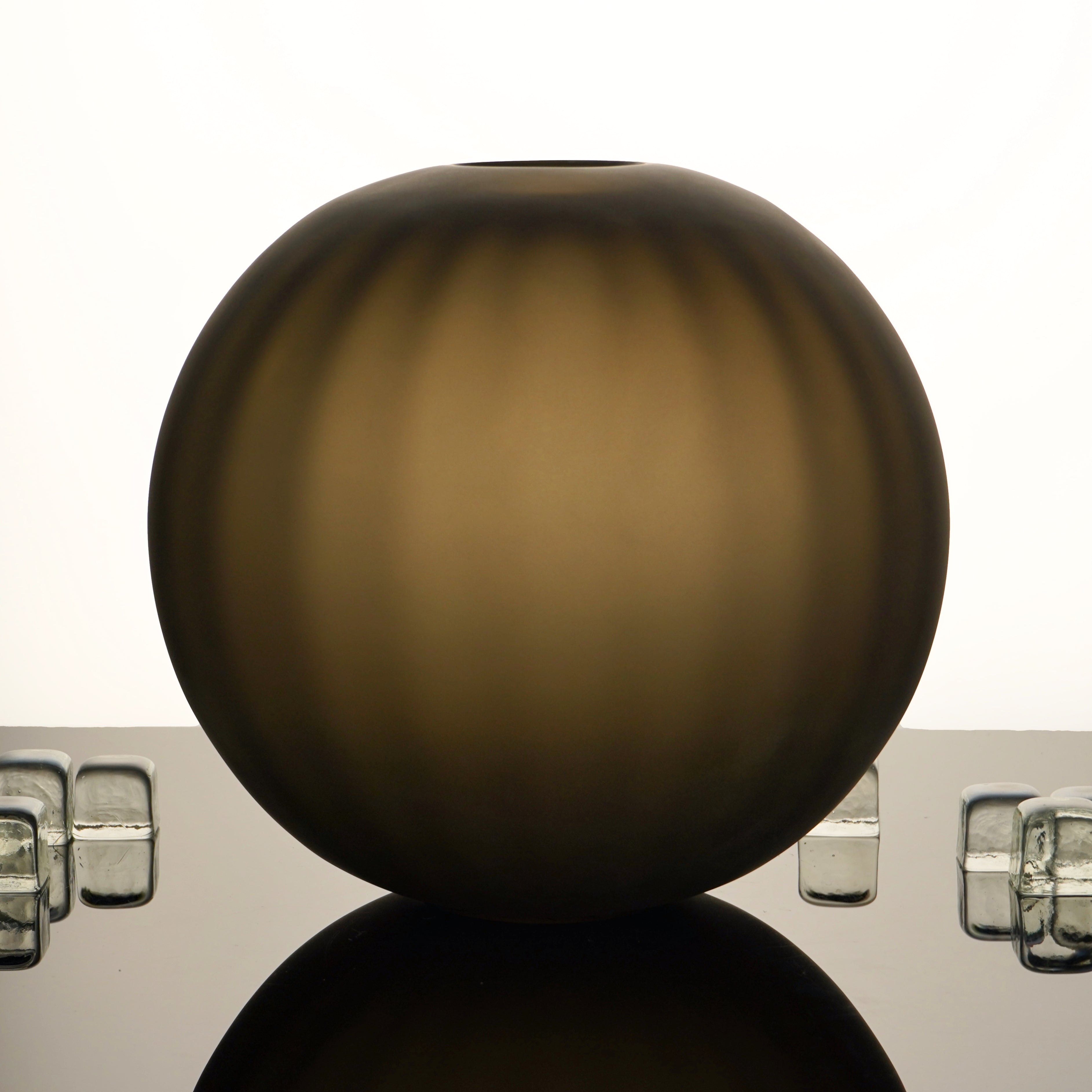 Handcrafted Correnti Murano Glass round vase with sleek steel and tobacco color scheme, made using artisanal techniques, perfect as a luxurious statement piece for art and design lovers.