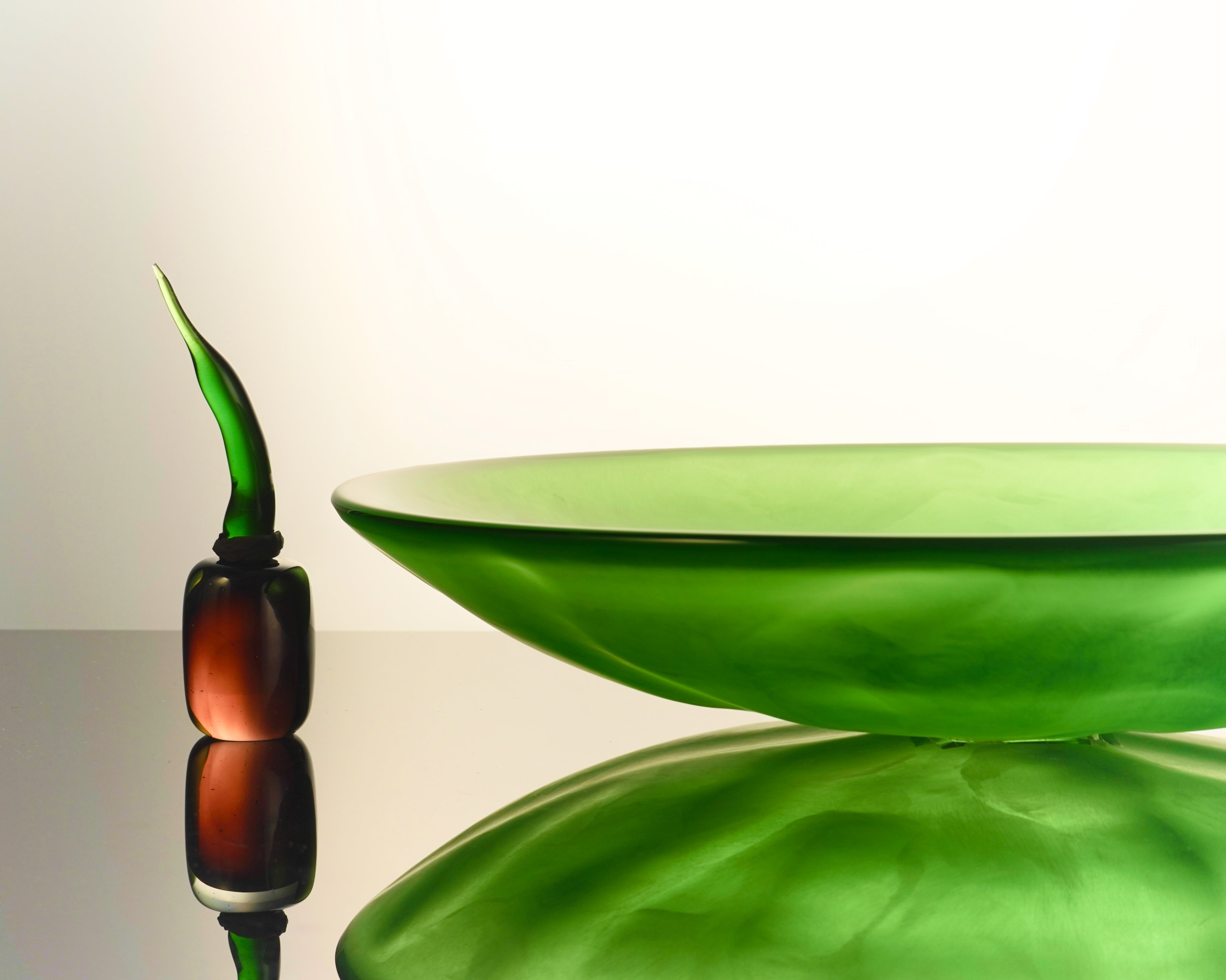 Armani Casa Deseo Centrepiece, handmade in Italy with exquisite craftsmanship. A sleek green design that adds sophistication and elegance to any living space.