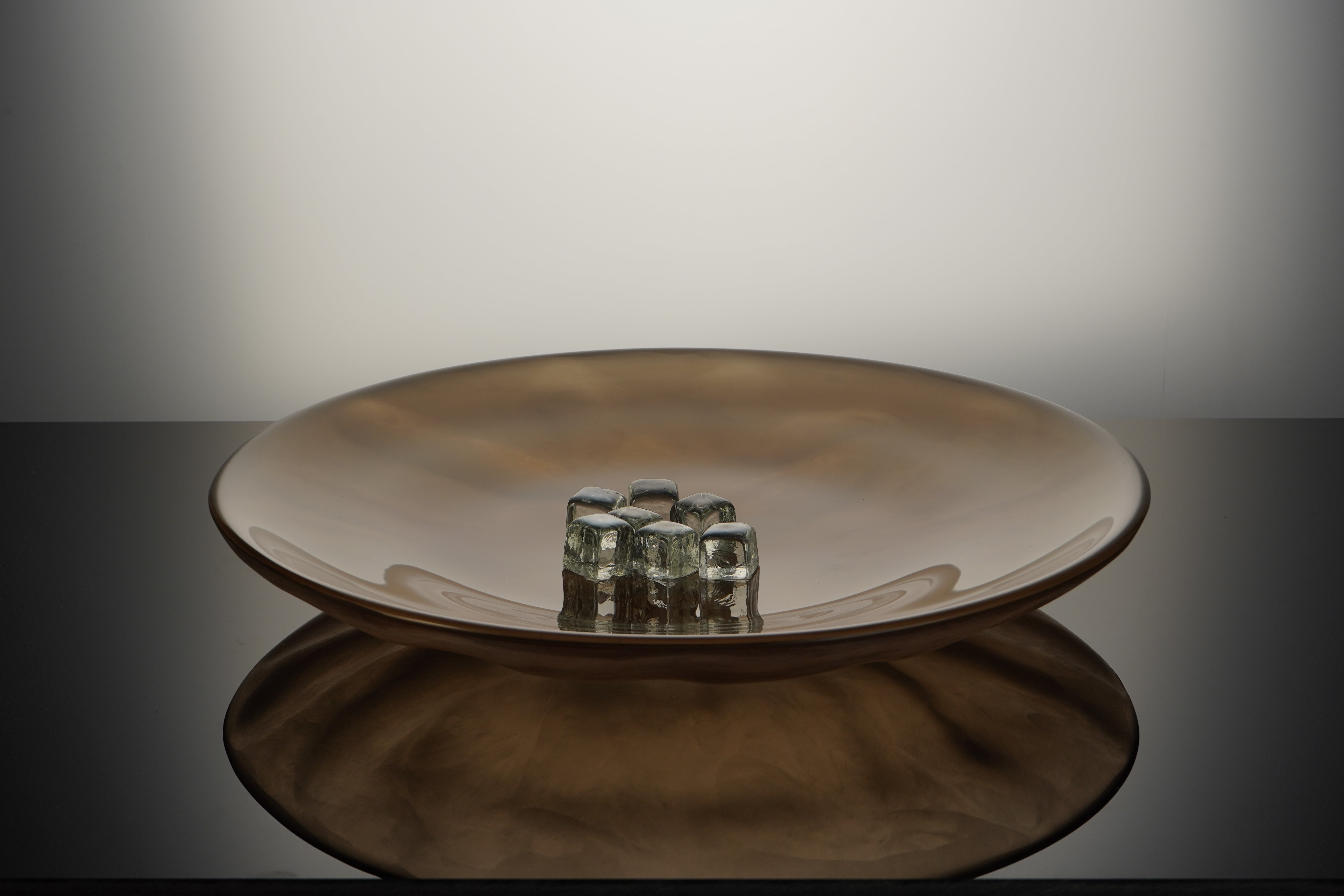 Armani Casa Deseo Centrepiece, handmade in Italy with Murano glass. A timeless, luxurious design that adds sophistication and elegance to any room.